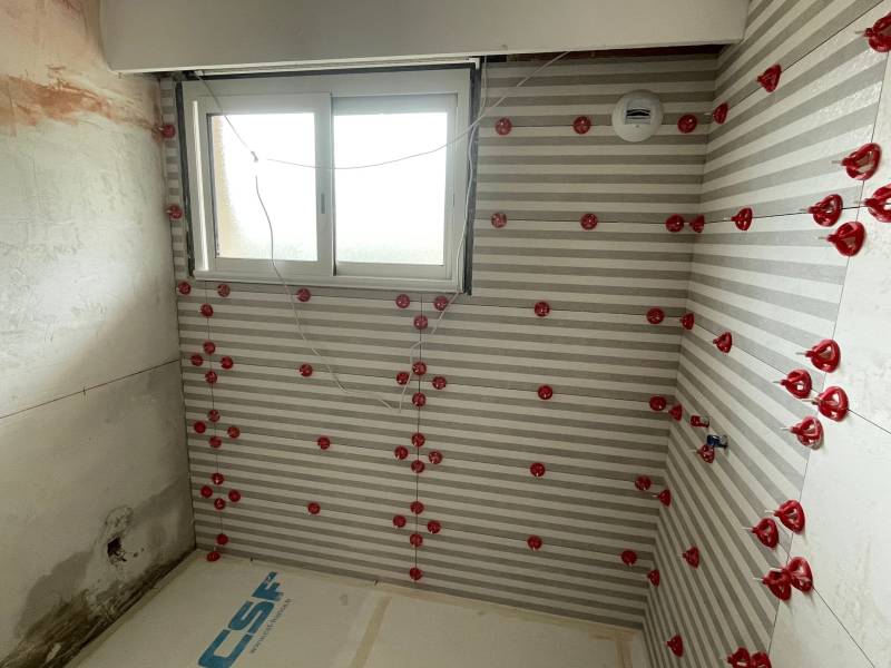 Pose de carrelage mural 