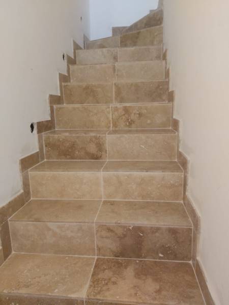 Pose de travertin escaliers